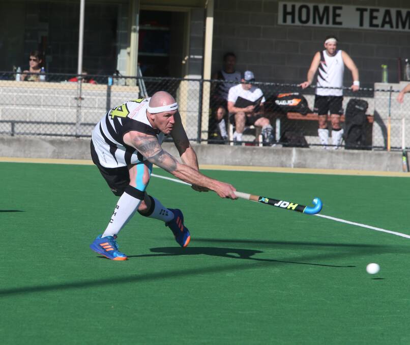 Sticks in action in Berry Blacks' 7-1 major semi-final win in Shoalhaven Hockey at the weekend. Photo: Robert Crawford