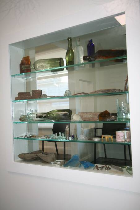 TREASURES: Some of the items found during the building's restoration now on display in the centre's waiting room.