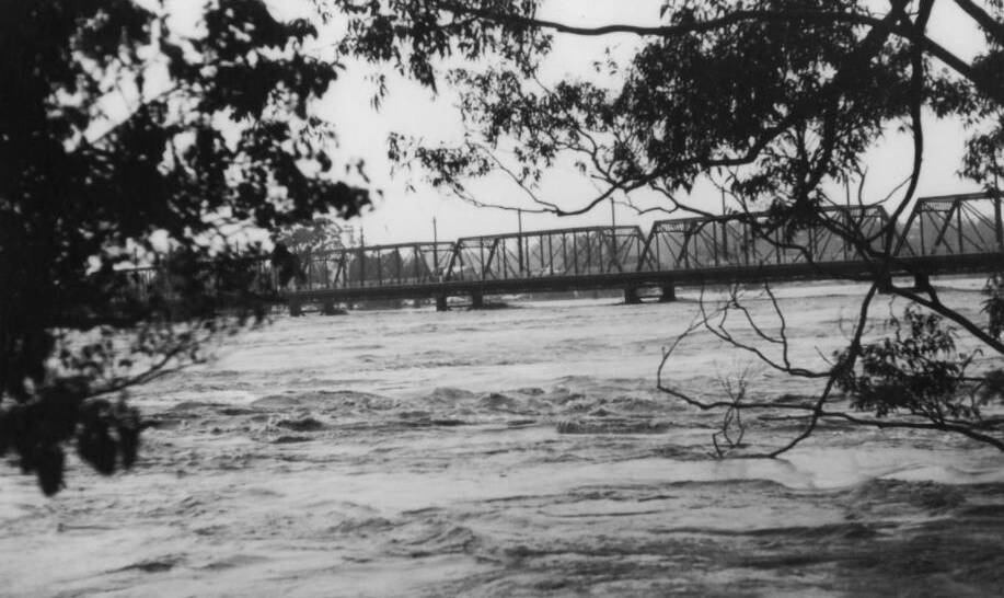 The 1974 flood in the Shoalhaven River from Bryce's farm looking south east. Photo: John Bryce - Shoalhaven Historical Society Collection.