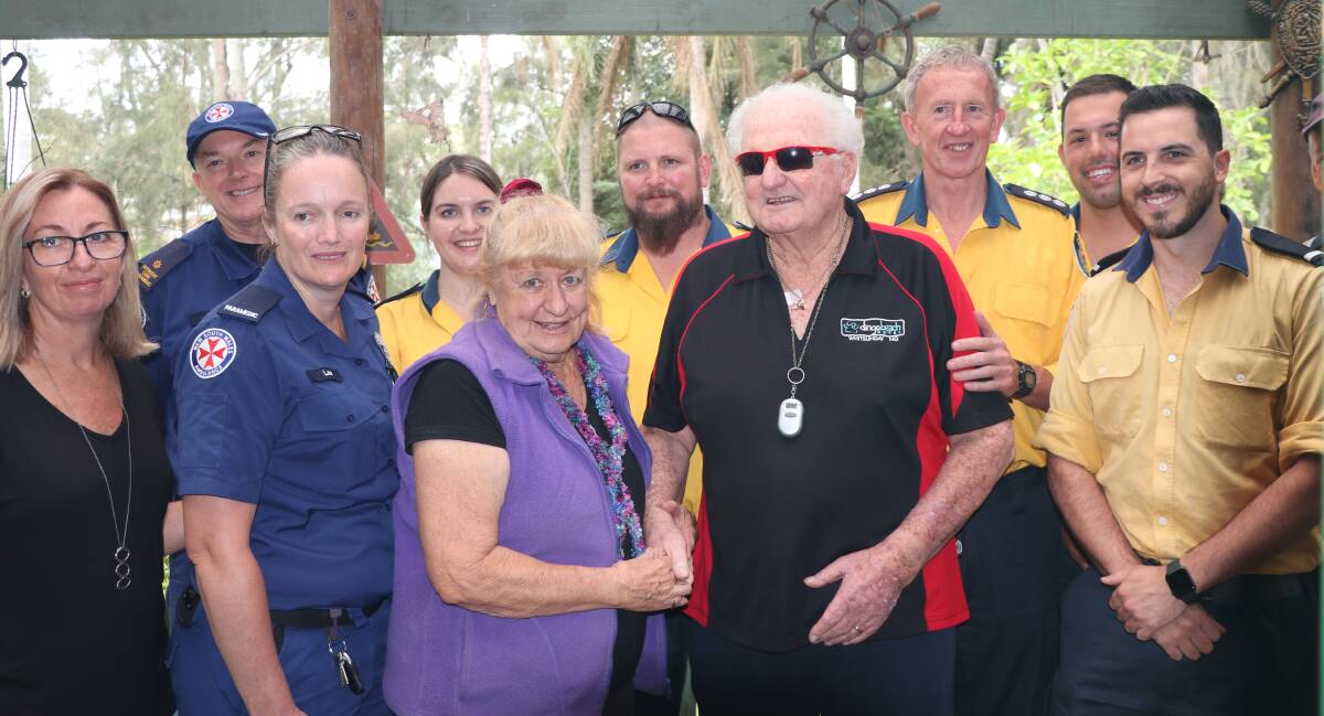 HEROES: Berrara's Bob and Carol Butler meet the RFS crew, paramedics and off-duty nurse Mandy Herbert who saved Bob's life in Currowan bushfire emergency after he suffered a heart attack. Photo: NSW Ambulance