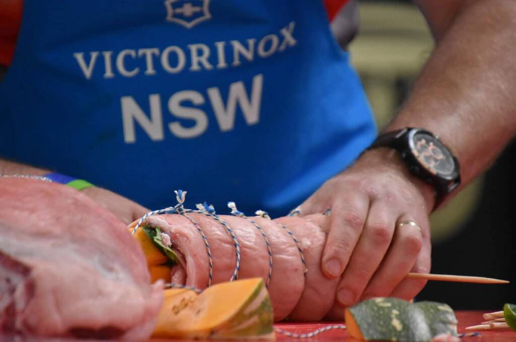 IN ACTION: Shoalhaven's Nathan Alcock in action during the State Butchers' Competition at the Showdown in the Showground at Hawkesbury at the weekend.