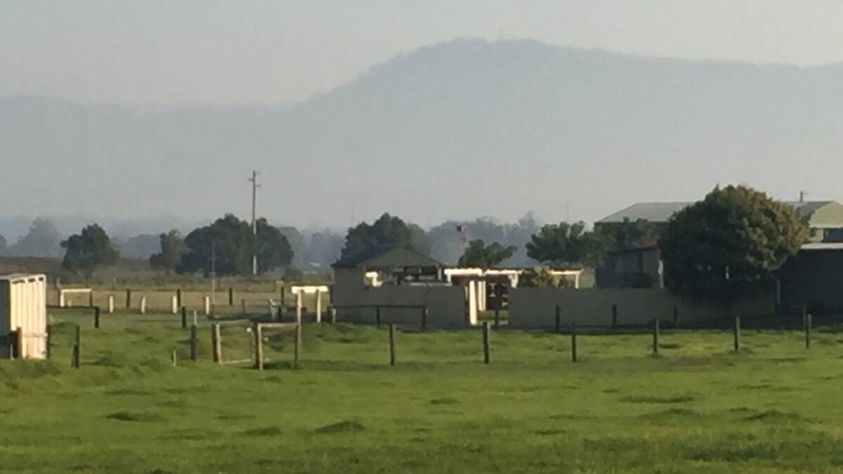 BARELY VISIBLE: Cambewarra Mountain was just a faint outline due to smoke haze across the northern Shoalhaven on Tuesday morning.
