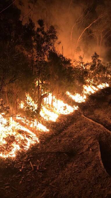
RFS crews had a busy night of backburning to bring St Georges Basin fire under control. Photo: Matthew Reeves NSWRFS