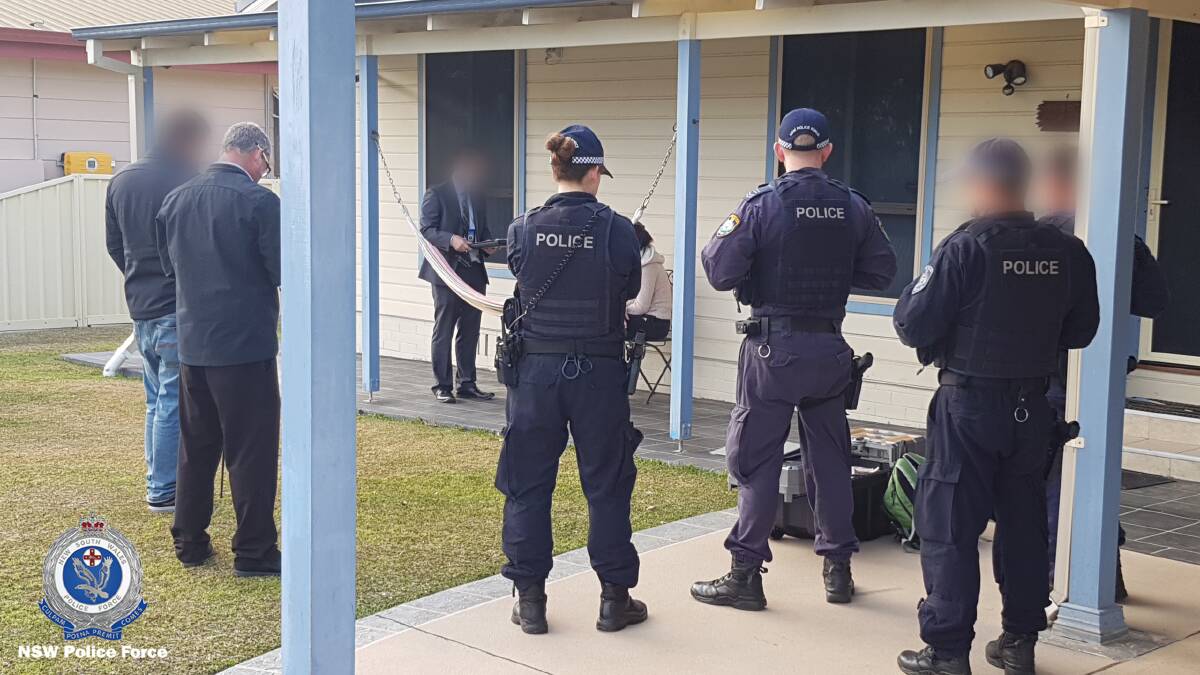 A 49-year-old man was arrested at Culburra Beach in the early hours of Friday morning by Strike Force Adnamira as part of Strike Force Raptor investigations into an alleged South Coast drug supply syndicate. Photo: NSW Police Media