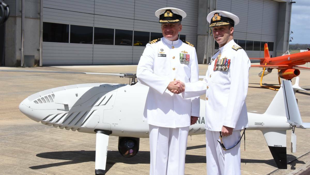 NEW SQUADRON: Chief of Navy Vice Admiral Michael Noonan and Commanding Officer of 822X Squadron, Commander Mick Rainey at the commissioning at HMAS Albatross.