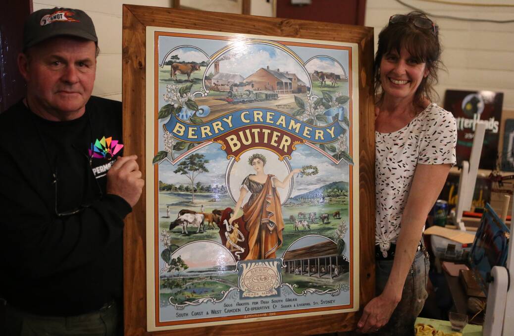 Sharon Fensome presents Peter Crossman with the Berry Creamery and Butter sign.