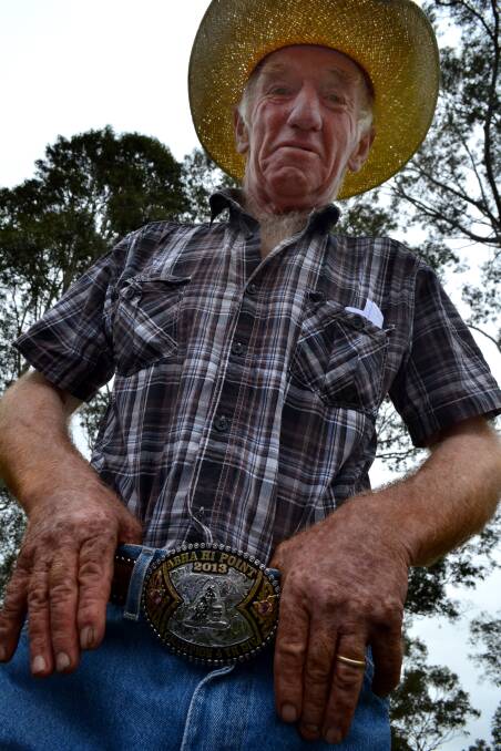 PROUD AS PUNCH: Terry Bennett shows of his Australia Barrel Horse Association [ABHA] championship belt buckle in 2014.