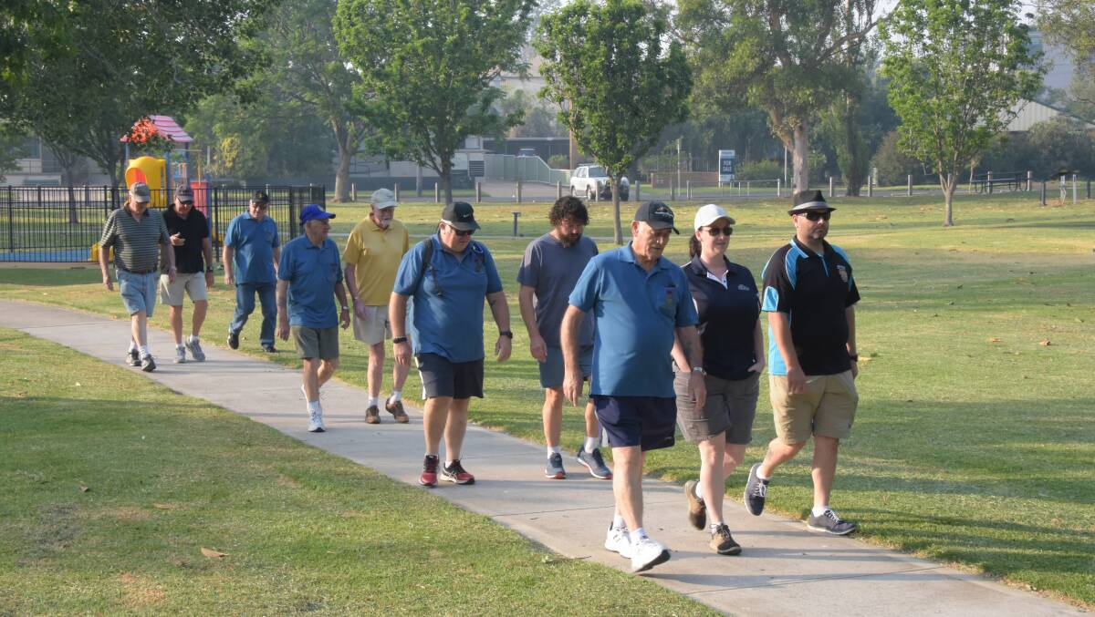 STEPPING OUT: Veterans take part in the inaugural Operation Walk to Talk in Harry Sawkins Park in Nowra last December. Photo: Courtney Ward