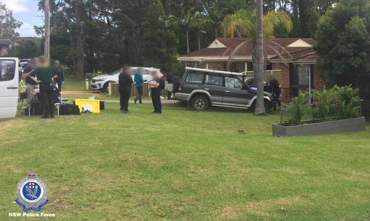 Police undertake a search of a property at whihc Joshua Lucas was arrested. Image: AFP
