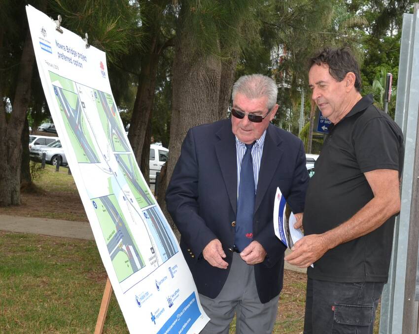 Shoalhaven Business Chamber spokesperson and transport business operator Tony Emery (right) and Shoalhaven City Councillor John Wells look over the plans at Monday’s launch.