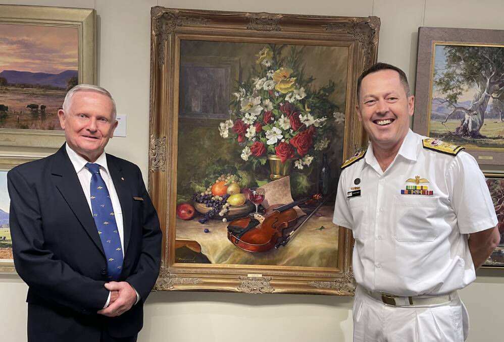 OFFICIAL OPENING: Commanding Officer of the Fleet Air Arm, Commodore Dave Frost and artist John Downton at the opening of the exhibition at the Fleet Air Arm Museum at HMAS Albatross.