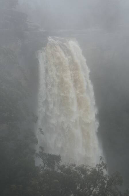 WOW: Ben Krikstolaitis captured the incredible amount of water pouring over Tianjara Falls, west of Nowra.