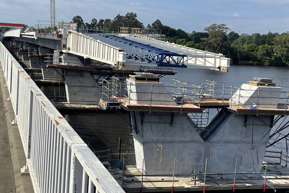 GROWING: The $342 million new Nowra bridge is almost three quarters of the way across the river.