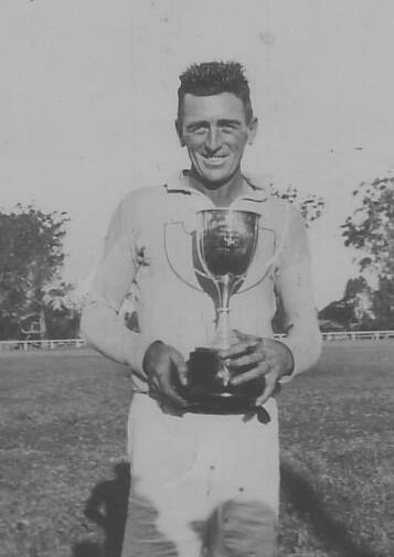 WINNERS: Pyree premiership winning captain Mick Regan with the 1935 reserve grade premiers, Peter Dawson Cup. 