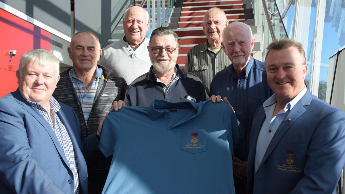 Keith Payne VC Veterans Benefit Group vice-chairman Fred Campbell (from left) and chairman Rick Meehan (front right) with the band of local volunteers who will continue the work of Australia's oldest VC (clockwise from left) Grahame Morrison, Renald Makila, Col Liddicoat, Spike Jones and Bob Brown.