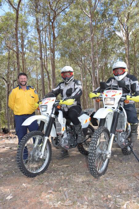 Shoalhaven District Officer Ross Smith with two fellow members of the local trail bike team Martin Copes and Mark Bourke