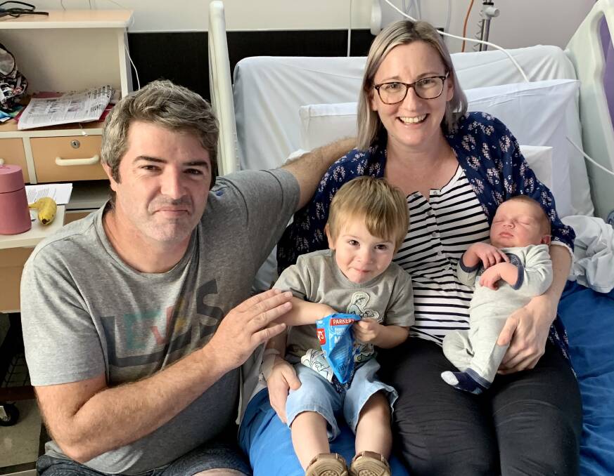 JUDE MAKES FOUR: Matt and Lee McCleary with Sidney and their new little boy Jude, who was born at Shoalhaven District Hospital on March 25.