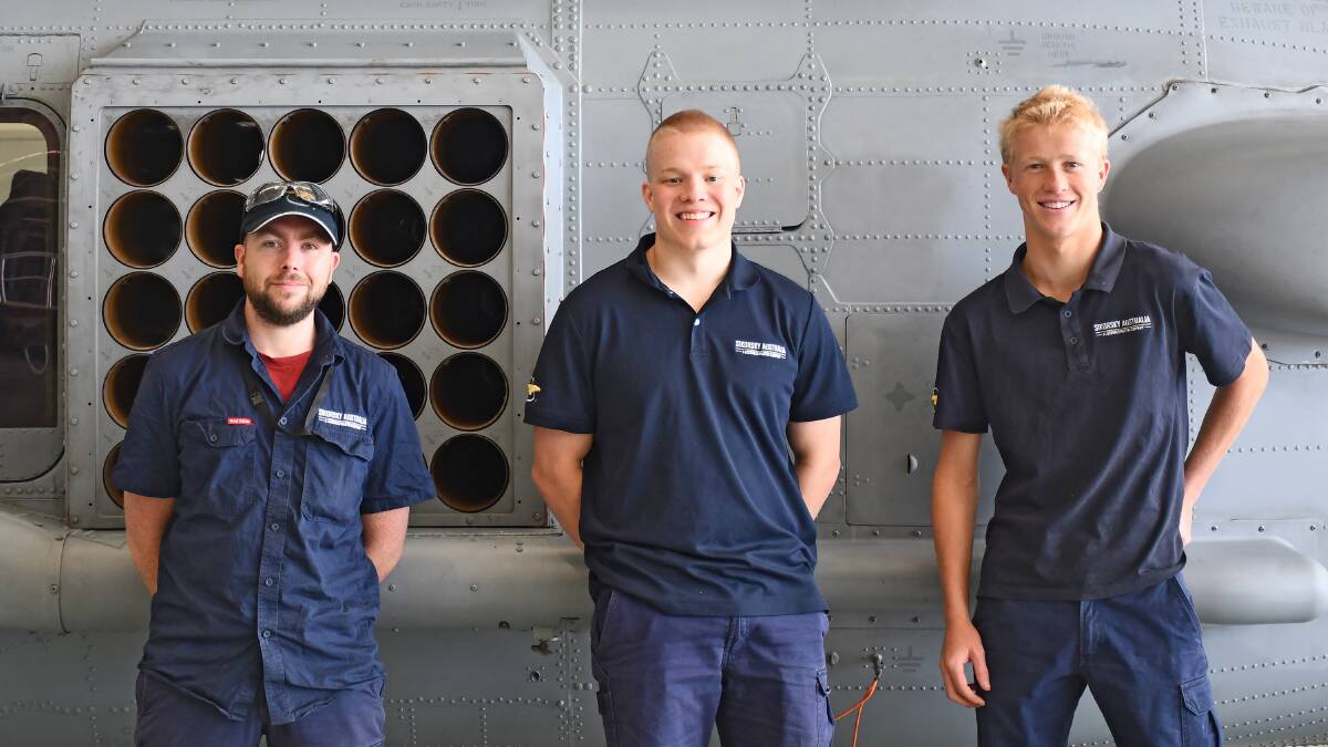 ON THE JOB: Sikorsky Australia Nowra apprentice Aircraft Maintenance Engineers Nicholas Cox, Mitchell West and Beau Buckpitt. Image: Supplied