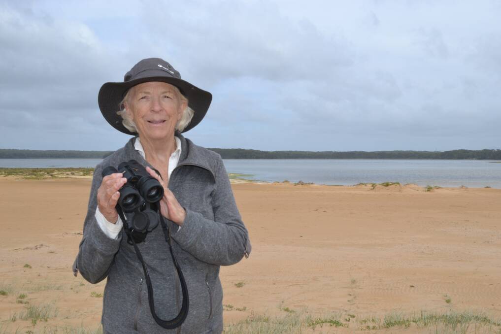 Frances Bray keeping an eye out for birds at her beloved Lake Wollumboola at Culburra Beach.