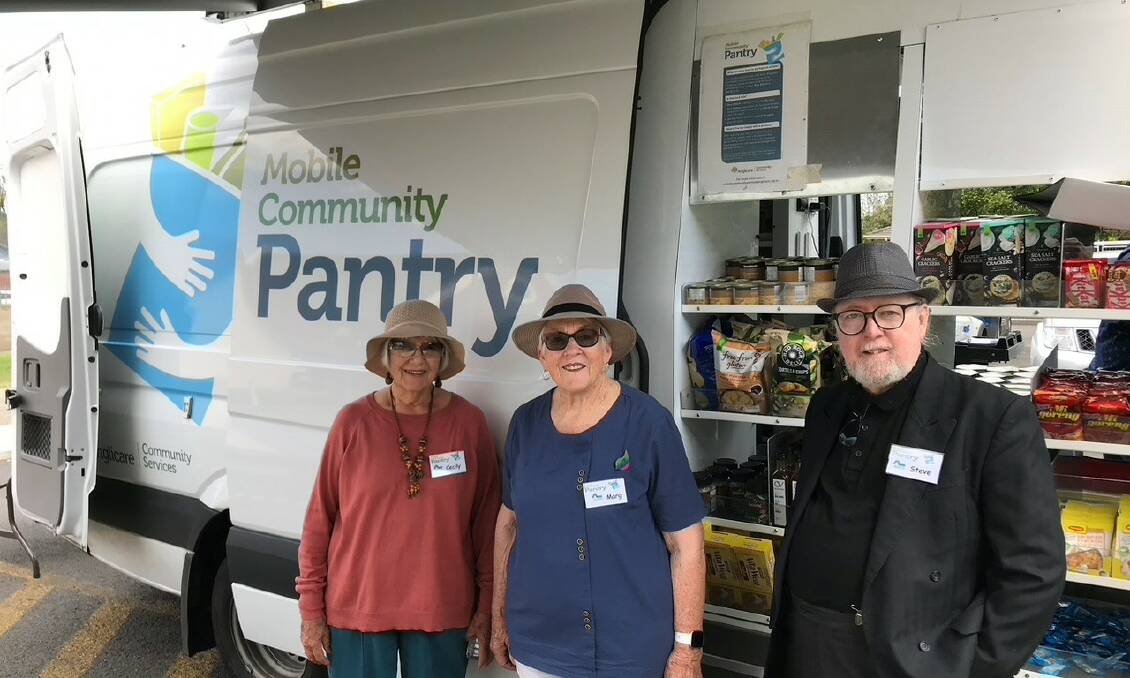 READY TO GO: Cecily, Marg and Steve ready to serve at the Anglicare Mobile Community Pantry program at All Saints Nowra.