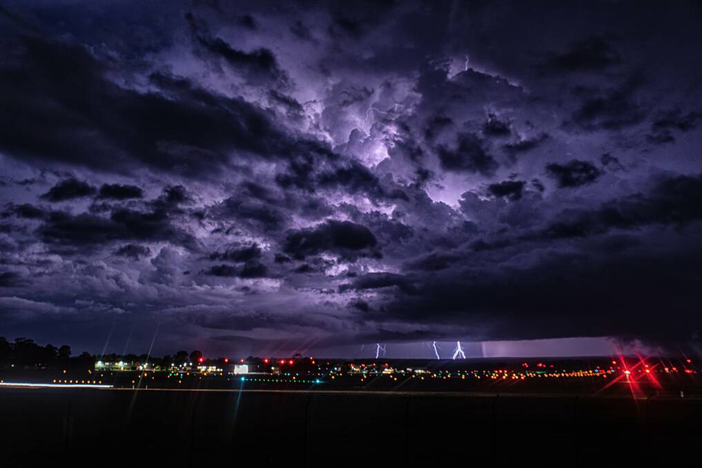SPECTACULAR: The power and beauty as a thunderstorm rolls across the airfield at HMAS Albatross. Photo: Matt Jeffrey