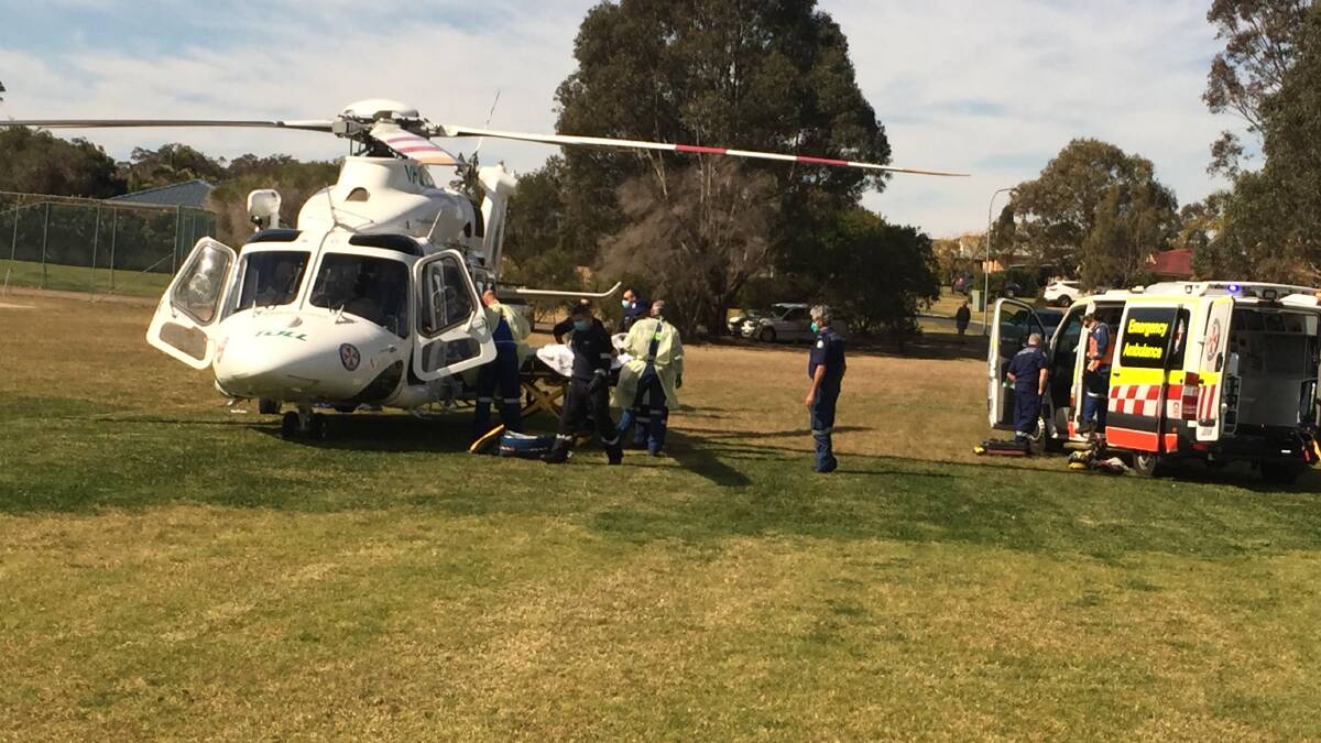 CRITICAL: The injured man is transferred to the Toll NSW Ambulance Rescue Helicopter.
