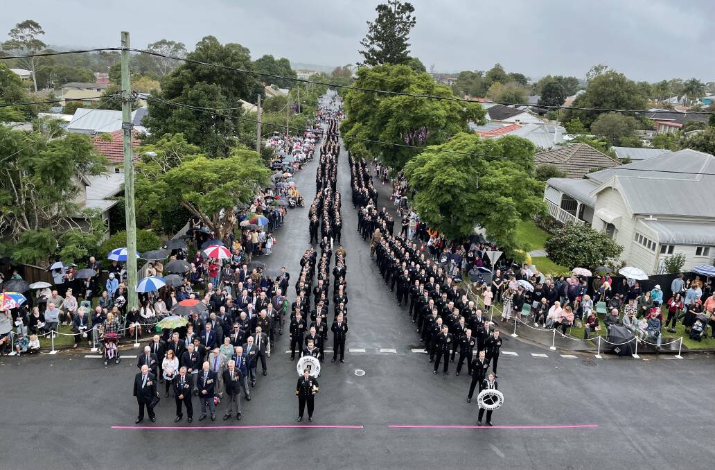 WHAT A SITE: The view from the memorial gates was certainly spectacular as the navy contingent and the large crowd in attendance for Anzac Day snaked its way back down Junction Street. 