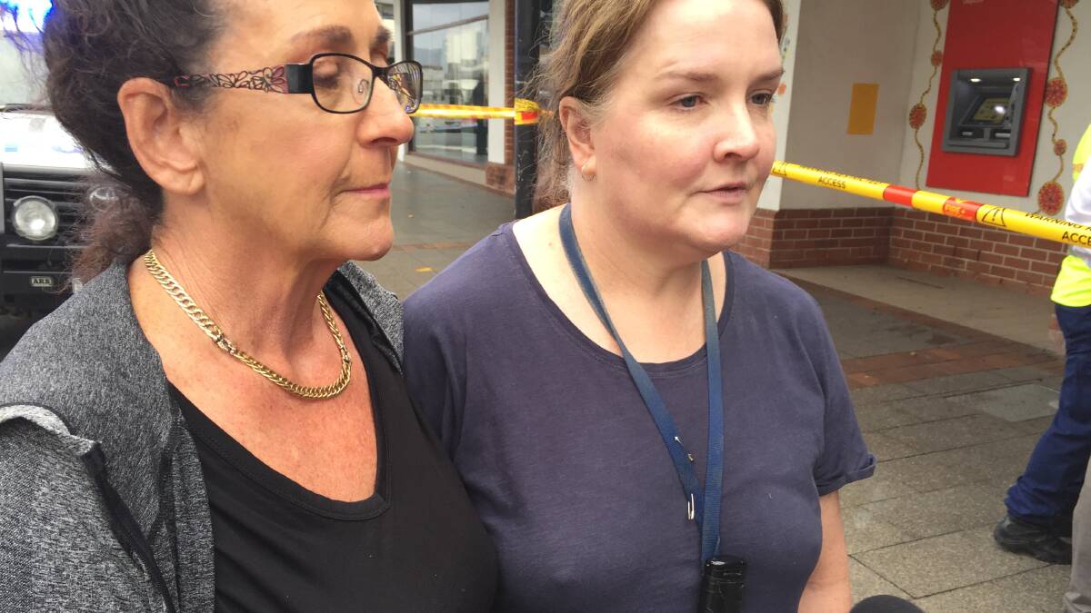 DEVASTATED: Lyrebird Dry Cleaners employees Lisa Etheridge and Vicki Lowbridge are devastated at the damage to the Nowra CBD business.