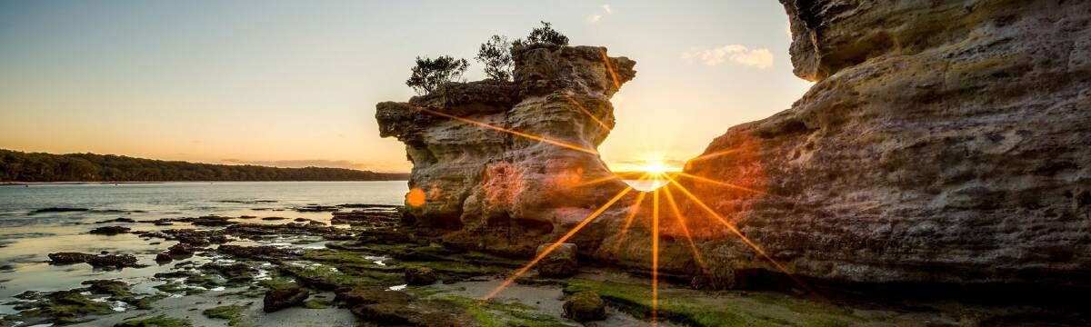CLOSED: Booderee National Park, including places like Hole-In-The-Wall, pictured here at sunset are closed until Tuesday, June 8 as a COVID precaution. Photo: Jon Harris Photography