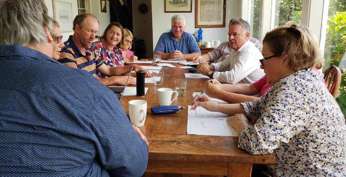 MEETING: Gilmore Labor candidate Fiona Phillips and Labor spokesperson for agriculture Joel Fitzgibbon meet with local dairy farmers.
