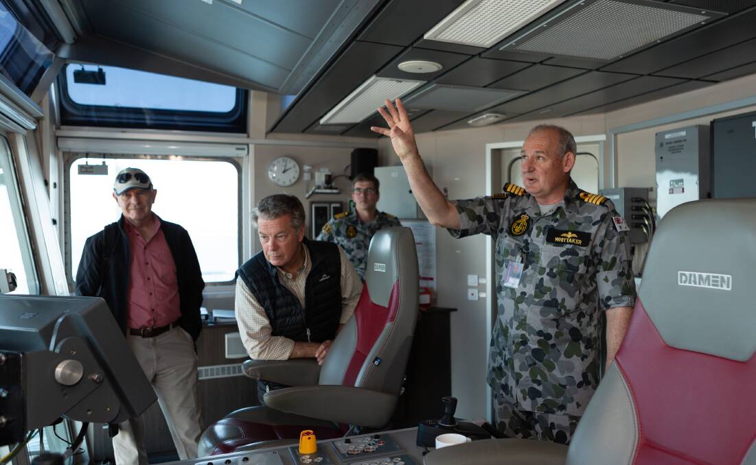 Captain Allen Whittaker CSC OAM (right) conducts a tour of the Multi-role Aviation Training Vessel (MATV) MV Sycamore, based at Jervis Bay.