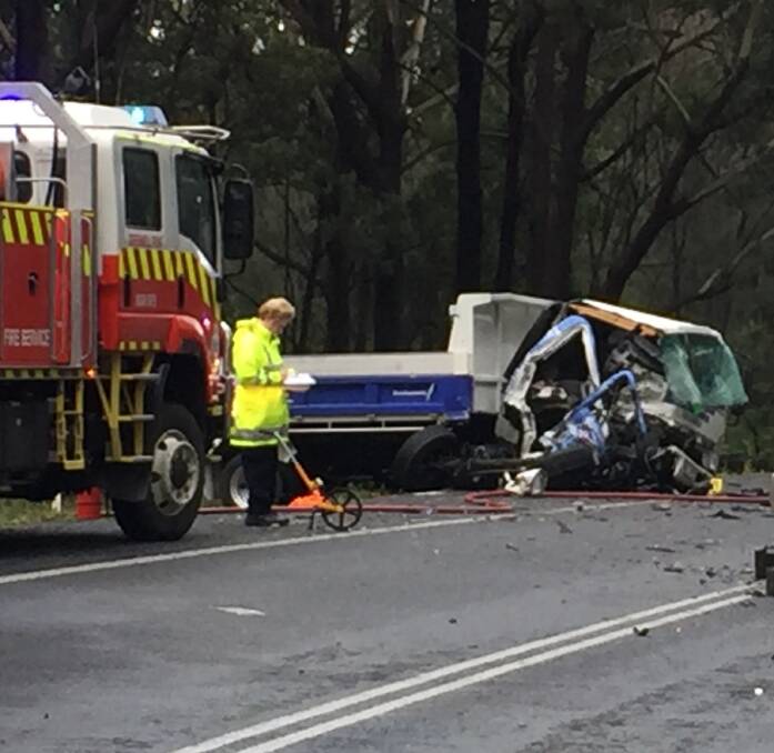 HORRIFIC: Emergency services personnel and witnesses faced an horrific scene at Tuesday morning's fatal accident on Culburra Road.
