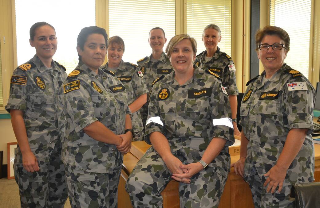 NEW LOOK COMMAND: HMAS Albatross commanding officer Captain Fiona Sneath (centre) with the air station's all female command team (from left) first lieutenant Lieutenant Commander Belinda Finlay, executive officer Commander Sue Cunningham, coxswain Chief Petty Officer Charmaine Edwards, area navy legal officer Lieutenant Commander Dominika Czaja, command staff officer Chief Petty Officer Linda Eddington and ship’s warrant officer Warrant Officer Sharon Campbell.