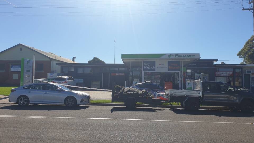 ROBBERY: Police at the Enhance Service Station on Greenwell Point Road, Greenwell Point.