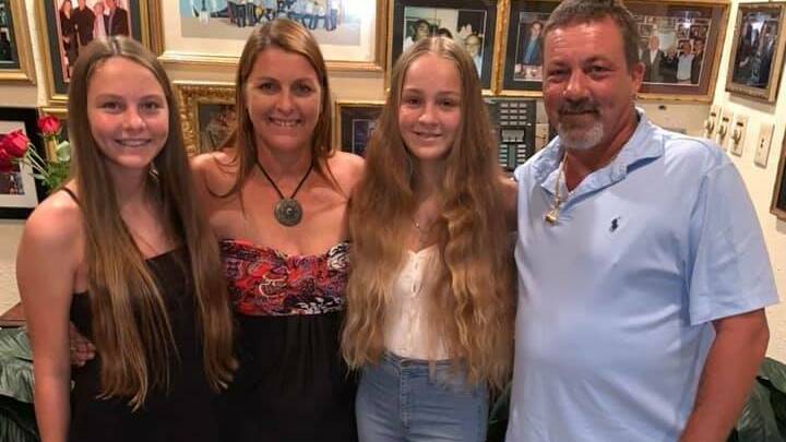 Former Shoalhaven local Susan Buzzi (nee Hickey) with her husband Pat and their daughters Tatiana and Airlee. Photo: Facebook