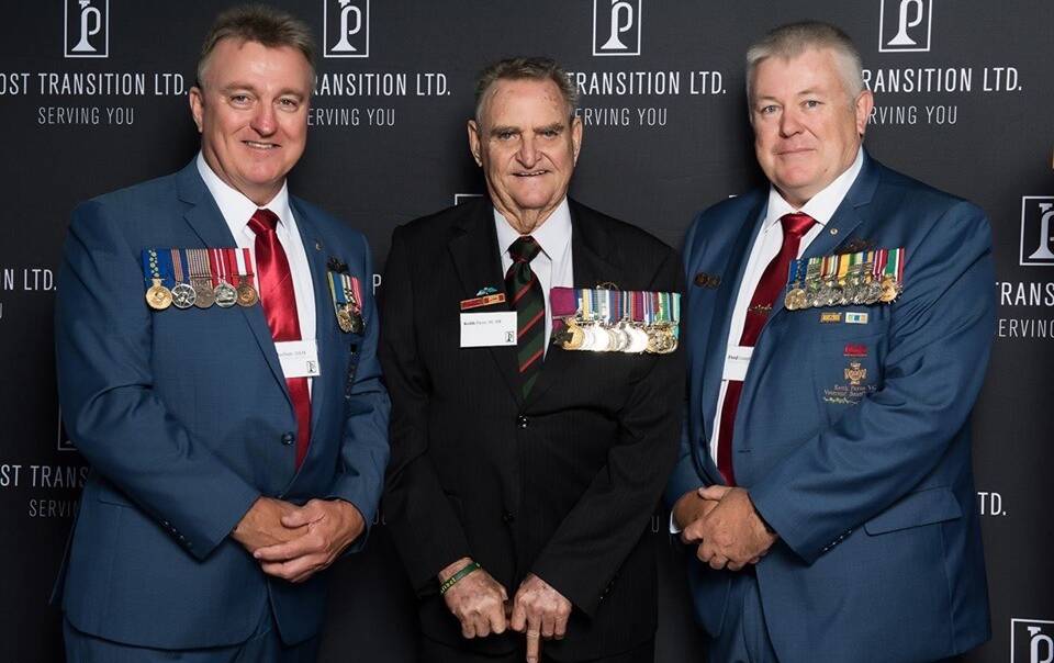 Keith Payne VC with the chairman of the Keith Payne VC Veterans Benefit Group Rick Meehan (left) and vice-chairman Fred Campbell.