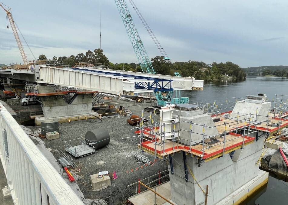 PROGRESS: Seven of 19 deck segments on the new $342 million Nowra bridge have been cast and have been launched over the Shoalhaven River.