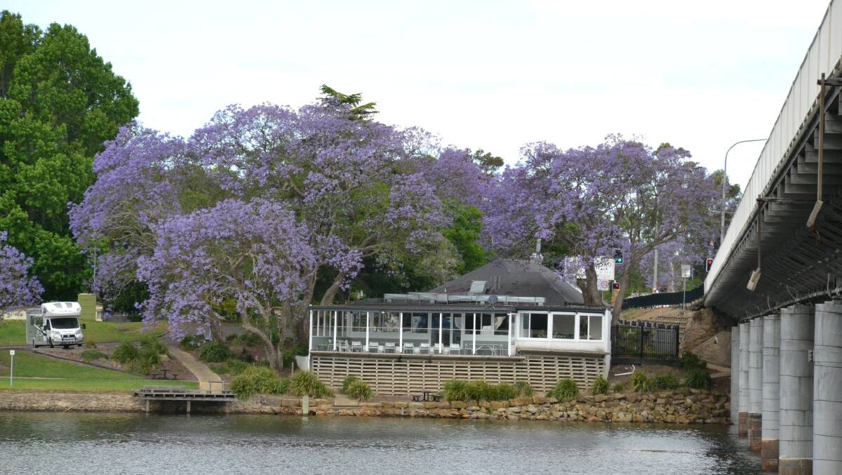 BEAUTIFUL PICTURE: The Wharf Road Restaurant site, overlooking the Shoalhaven River with its iconic purple flowering jacarandas which have featured in numerous photos over the years, has been sold to Sydney investors.
