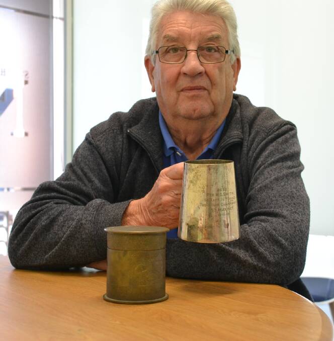 Shoalhaven resident Allen ‘Pud’ Abernethy with his cousin’s, Private William Smith’s World War I Tug-A-War championship cup.