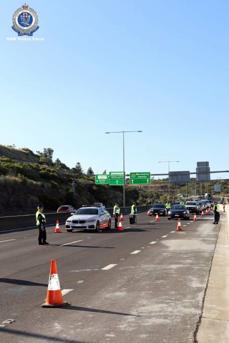 BOMBO OPERATION: Lake Illawarra Police District conduct COVID compliance checks along the Princes Highway at Bombo. Image: NSW Police