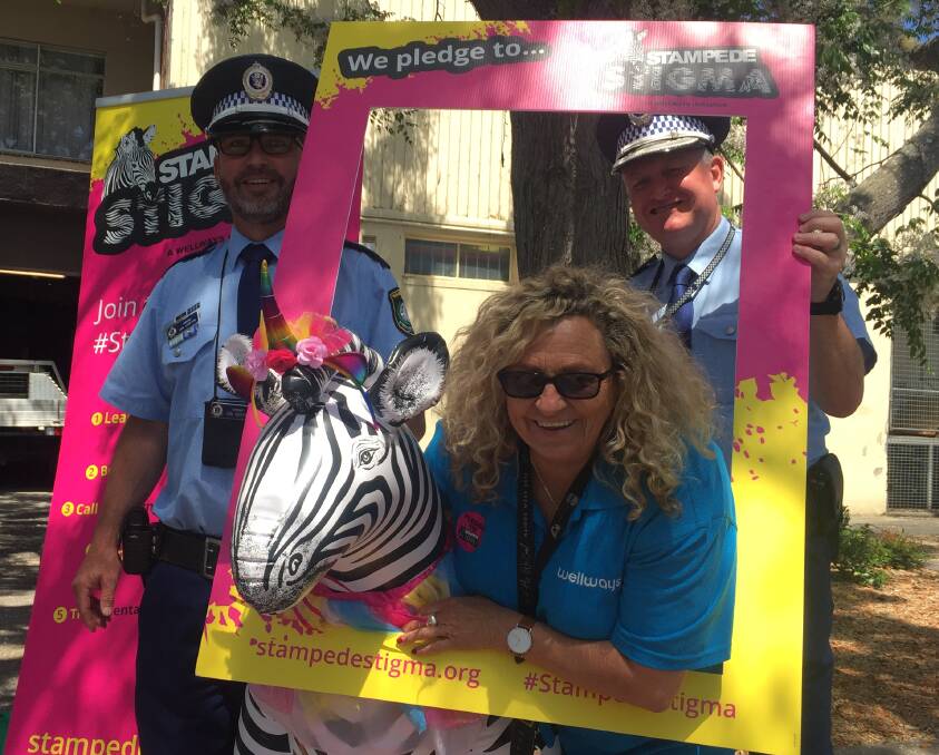 GREAT DAY: Stampede Stigma event event organiser and Wellways key recovery worker Kathy Musico with South Coast Police Acting Inspector Ian Griffin and Commanding Officer of the Nowra Police Station Inspector Ray Stynes.
