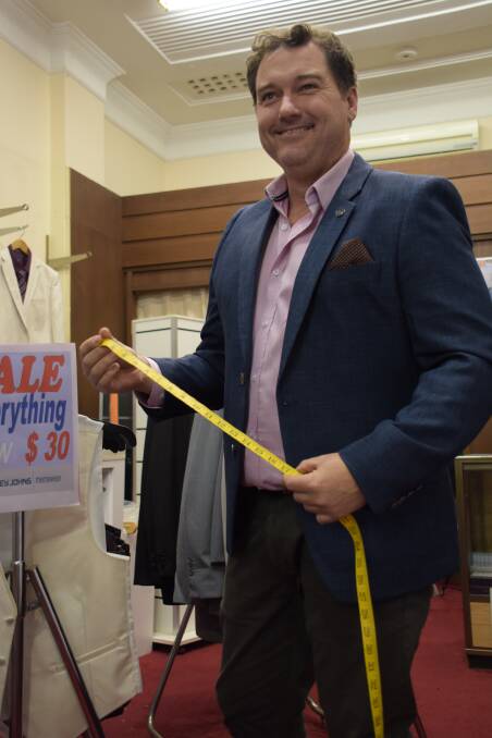 Stanley Johns Menswear owner David Harrison is ready to hang up his trusty tape measure.