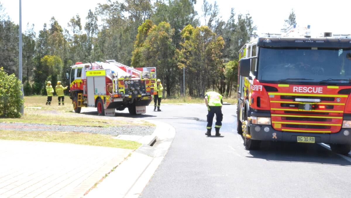 Fire crews at Tuesday's deliberately lit fire in Worrigee.
