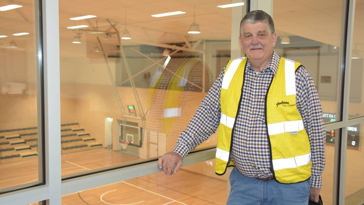 John Martin looks over the Shoalhaven Indoor Sports Centre show court named in his honour from the mezzanine area.
