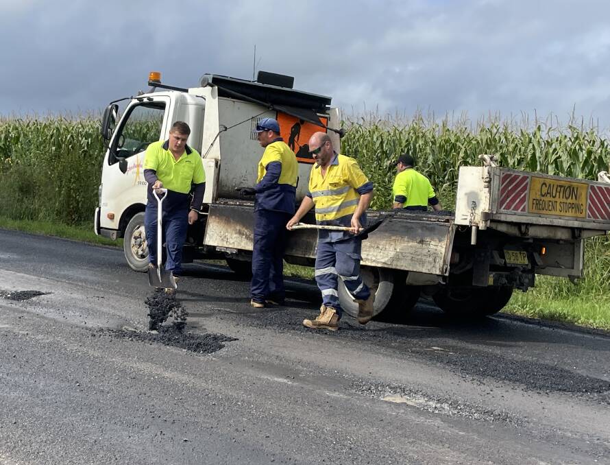 ON THE JOB: Shoalhaven City Council road crews repairing Greenwell Point Road at Brundee, east of Nowra.