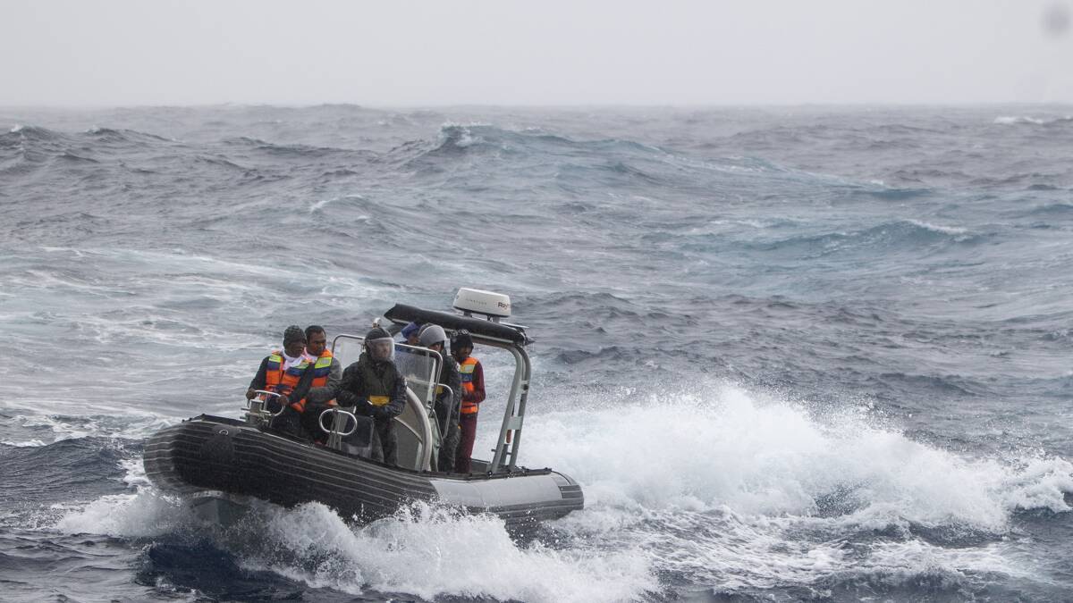 Rescue of fishermen whose boat was sinking in the southern Indian Ocean. Photos: Thomas Sawtell 