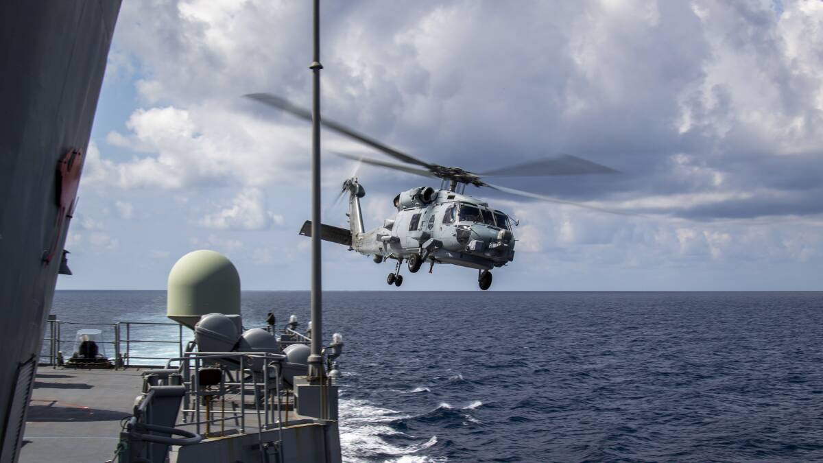 2000 HOURS: HMAS Anzac's embarked MH-60R Seahawk Berserker from 816 Sqaudron at HMAS Albatross recently reached her 2000th flight hour, working in support of Indo Pacific Endeavour 21.Photo: Thomas Sawtell