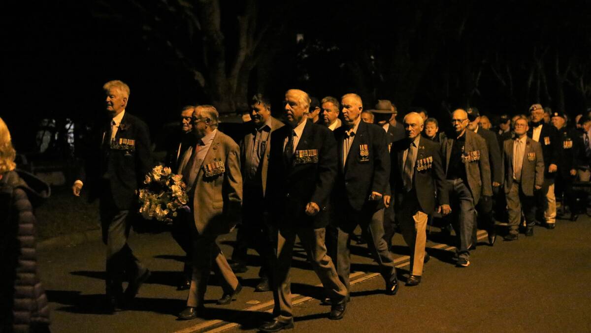 RESPECT: Veterans march to Anzac Park at Greenwell Point.