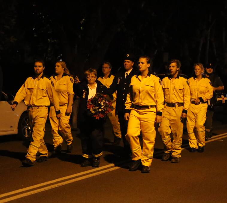 Rural Fire Service members take part in the annual Greenwell Point Anzac Day dawn service.