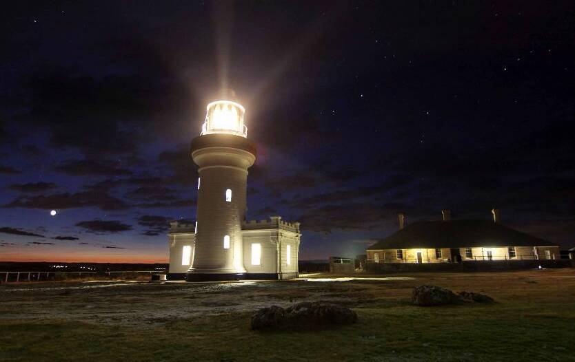 Point Perpendicular looks brilliant lit up at night.  The lighthouse on the Beecroft Peninsula will be operating as part of the 16th International Lighthouse and Lightship weekend.Photo: Marie Clout